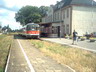 powiększ