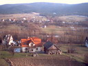 powiększ