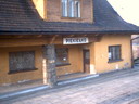 powiększ