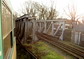 powiększ