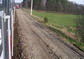 powiększ