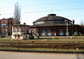 powiększ
