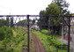 powiększ