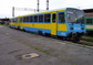 powiększ