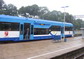 powiększ