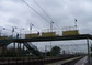 powiększ