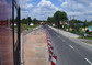 powiększ