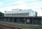 powiększ