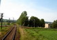 powiększ