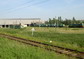 powiększ