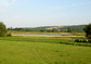 powiększ