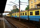 powiększ