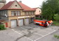 powiększ