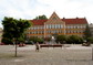 powiększ