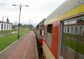 powiększ