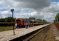 powiększ