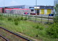 powiększ