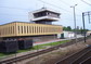 powiększ